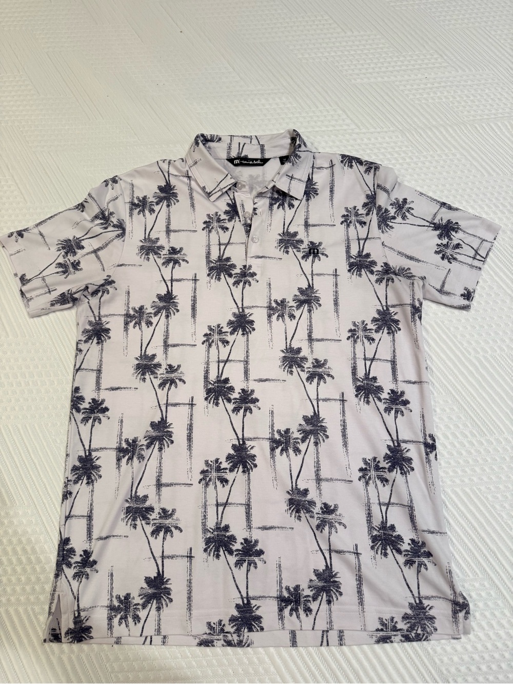 Travis Mathew White Polo with Black Palm Print
